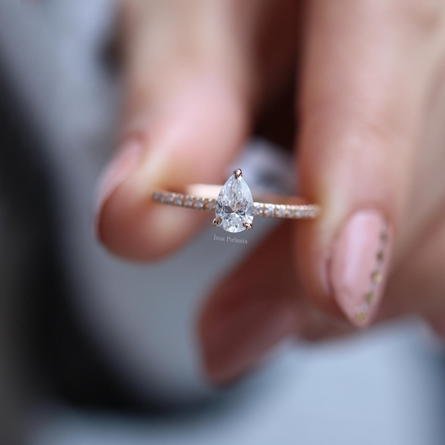 0.50 Carat Pear Cut Diamond Solitaire Ring with Side Stones
