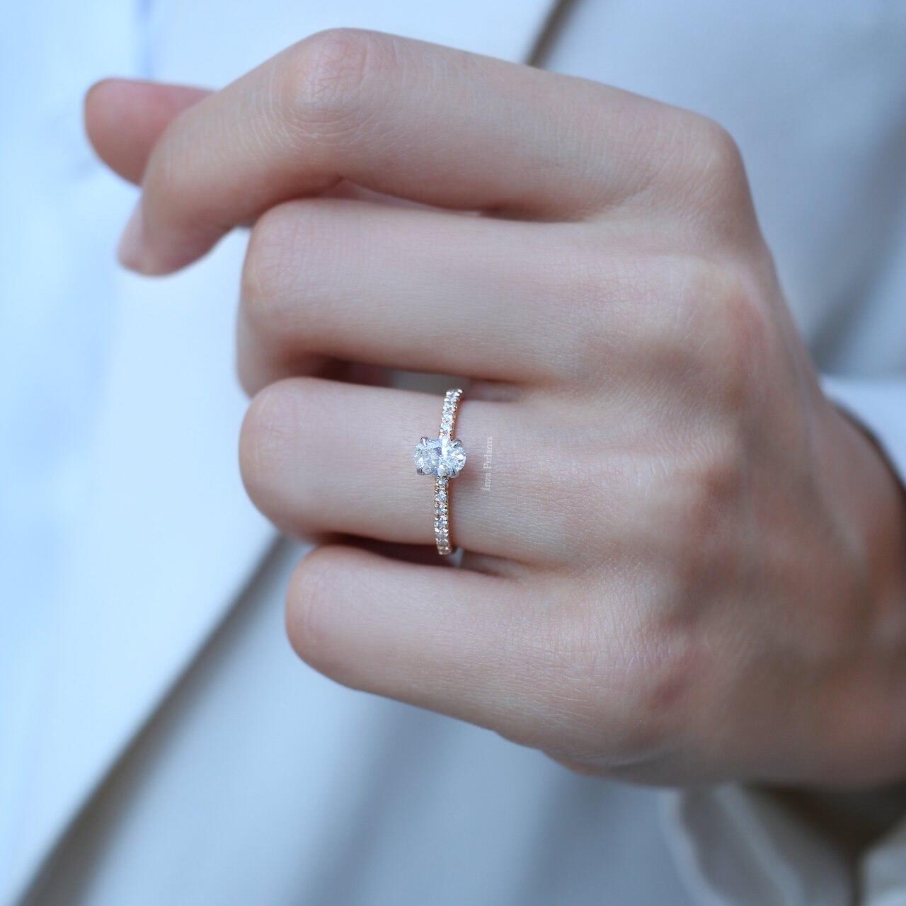 0.70 Carat Oval Diamond Solitaire Ring with Side Stones