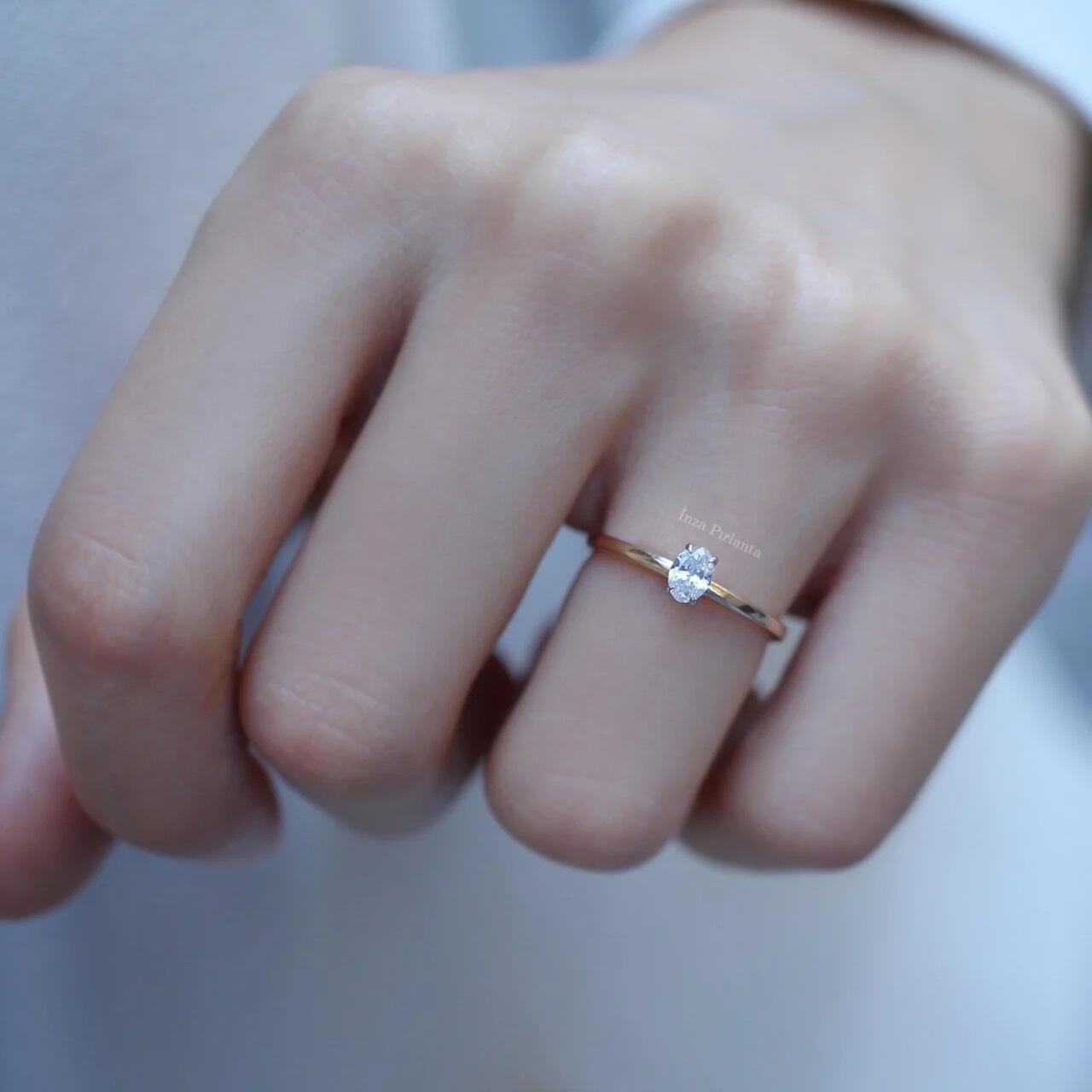 0.25 Carat Oval Diamond Solitaire Ring