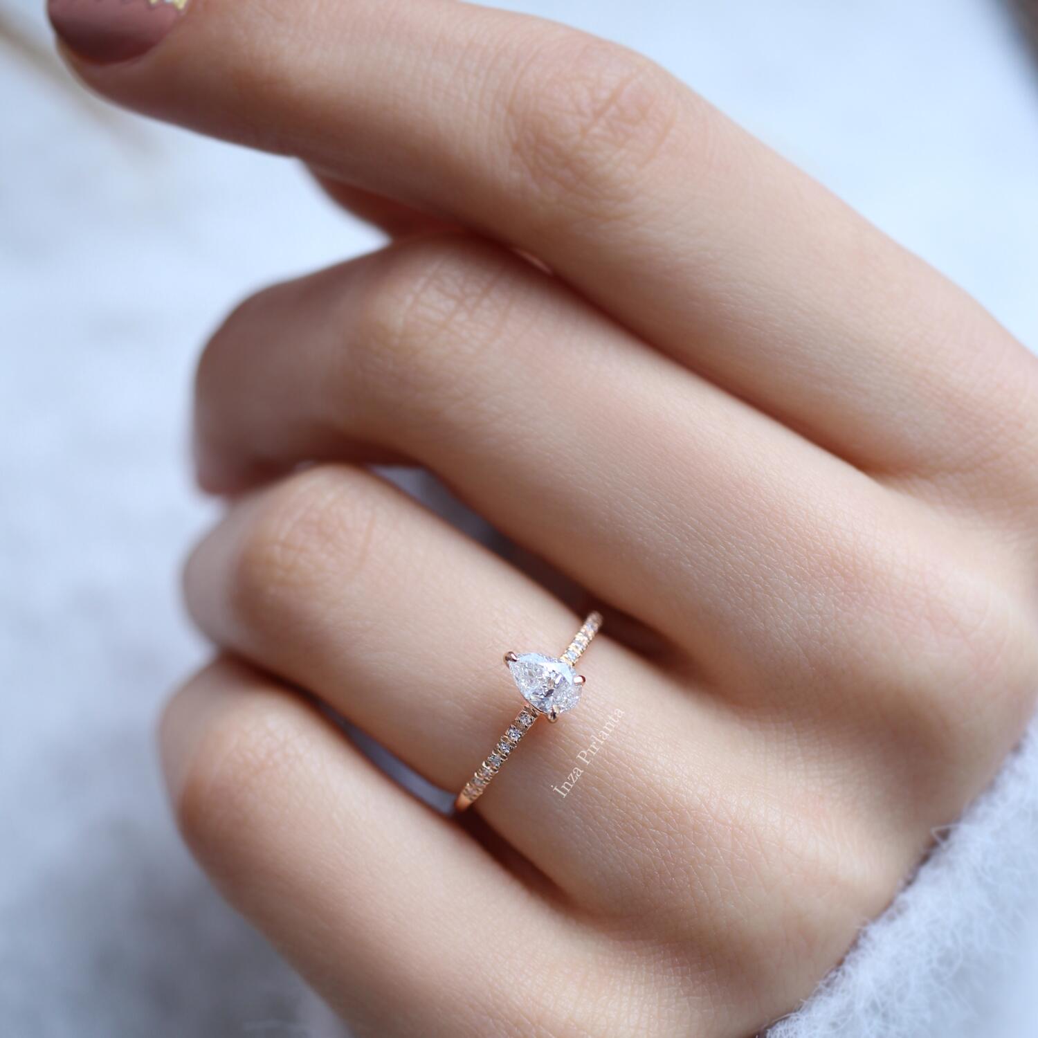 0.50 Carat Pear Cut Diamond Solitaire Ring with Side Stones
