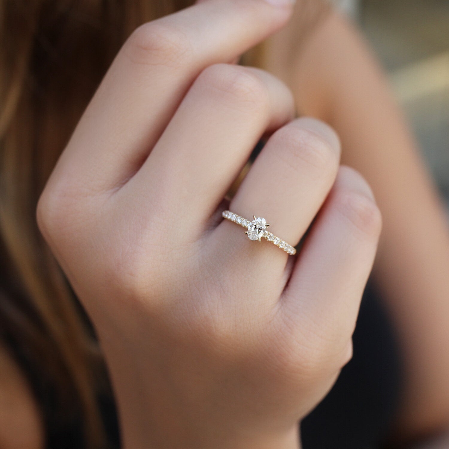 0.50 Carat Oval Diamond Solitaire Ring with Side Stones