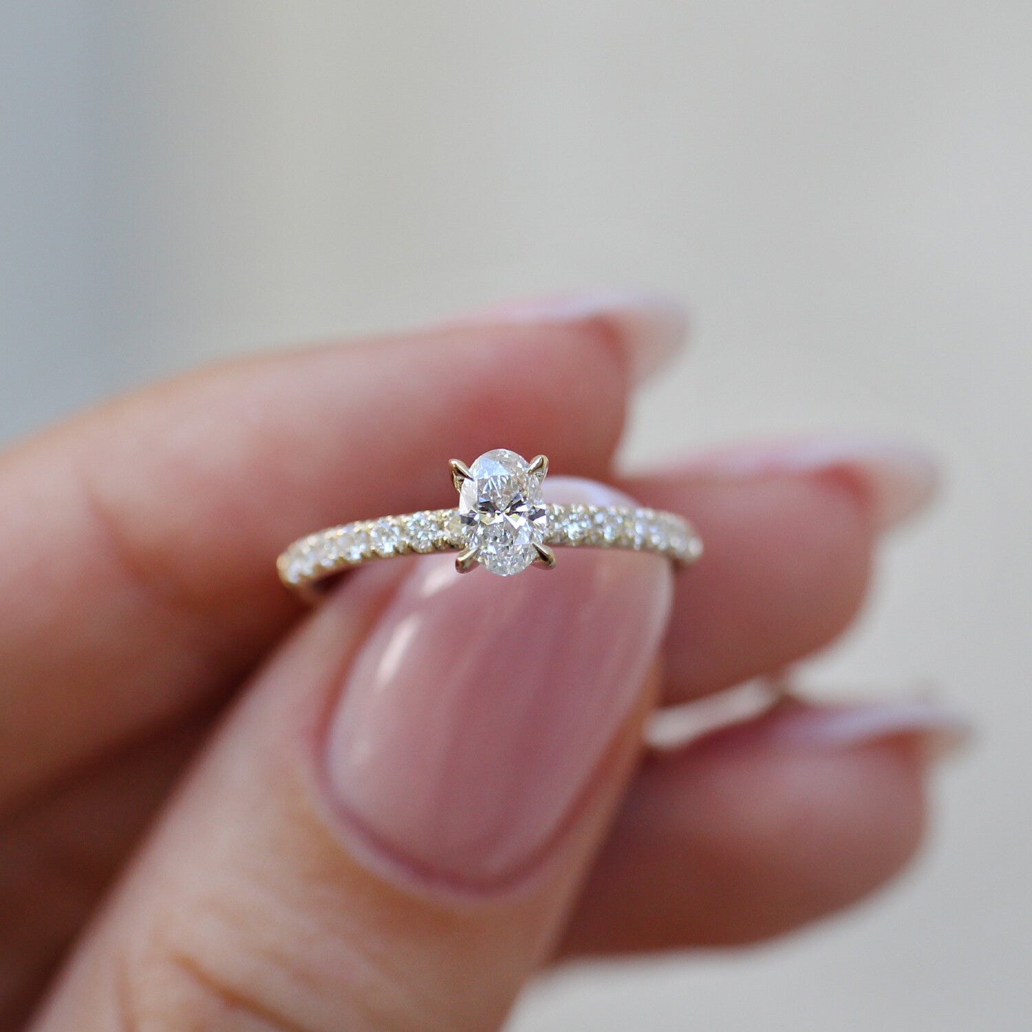 0.50 Carat Oval Diamond Solitaire Ring with Side Stones