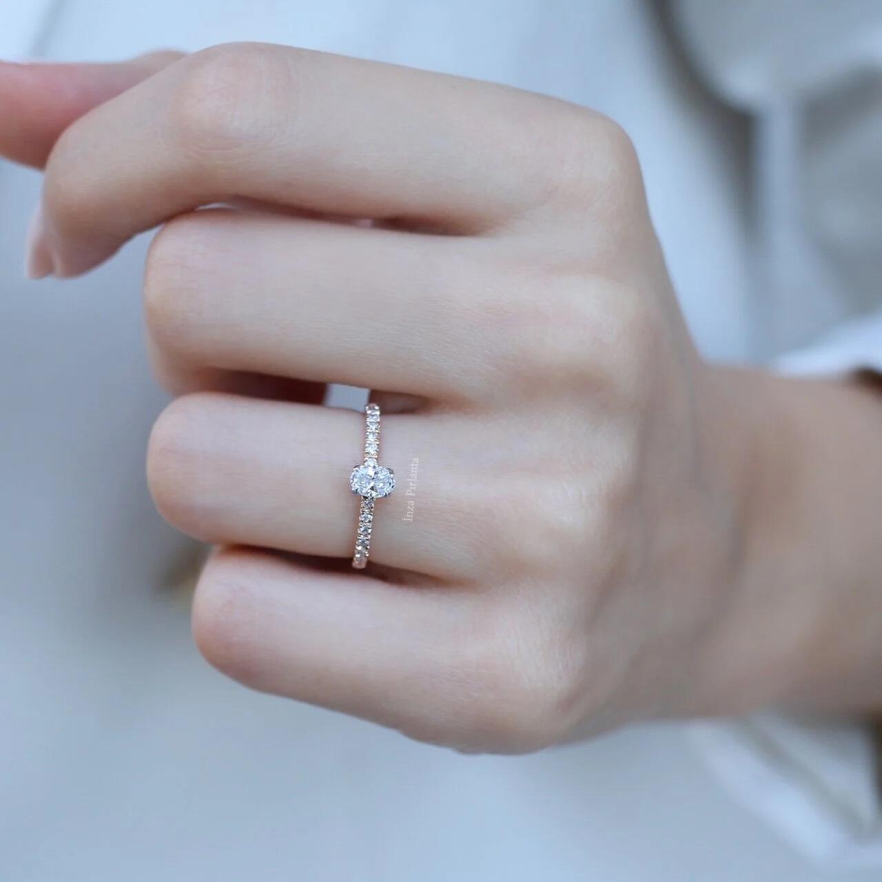 0.50 Carat Oval Diamond Solitaire Ring with Side Stones
