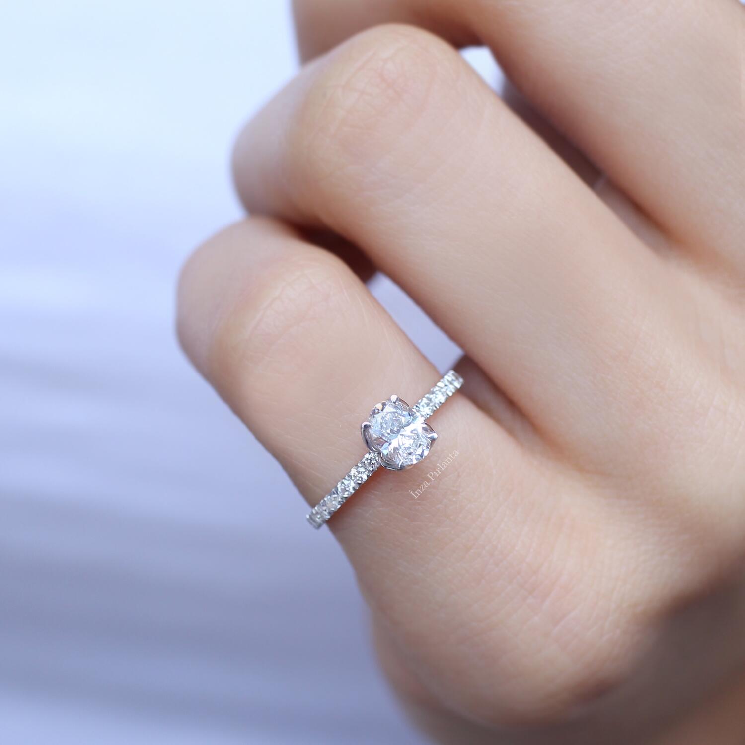 0.70 Carat Oval Diamond Solitaire Ring with Side Stones
