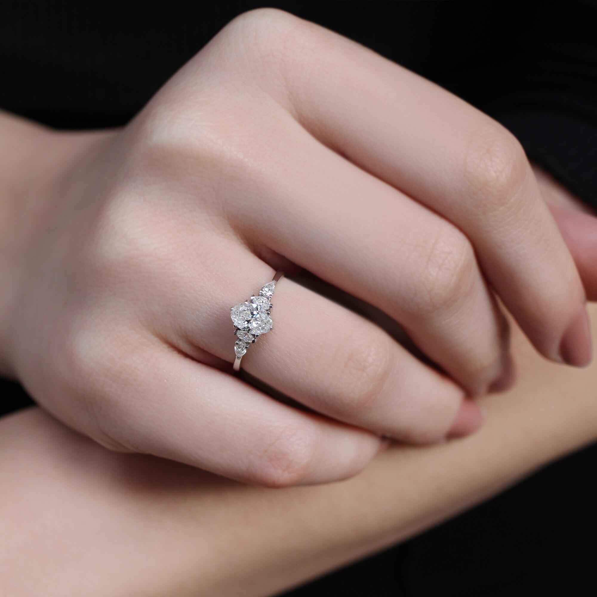 0.90 Carat H VS2 GIA Certified Vintage Diana Oval Diamond Ring