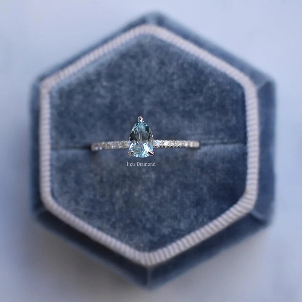 Exklusiver Aquamarin-Tropfenring mit Diamanten